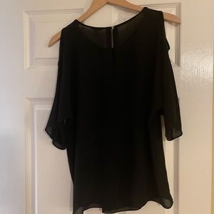 Calvin Klein black shoulder cut out short sleeve shirt.